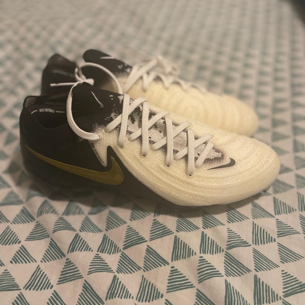 Nike Black and Cream Sneakers with Iconic Design